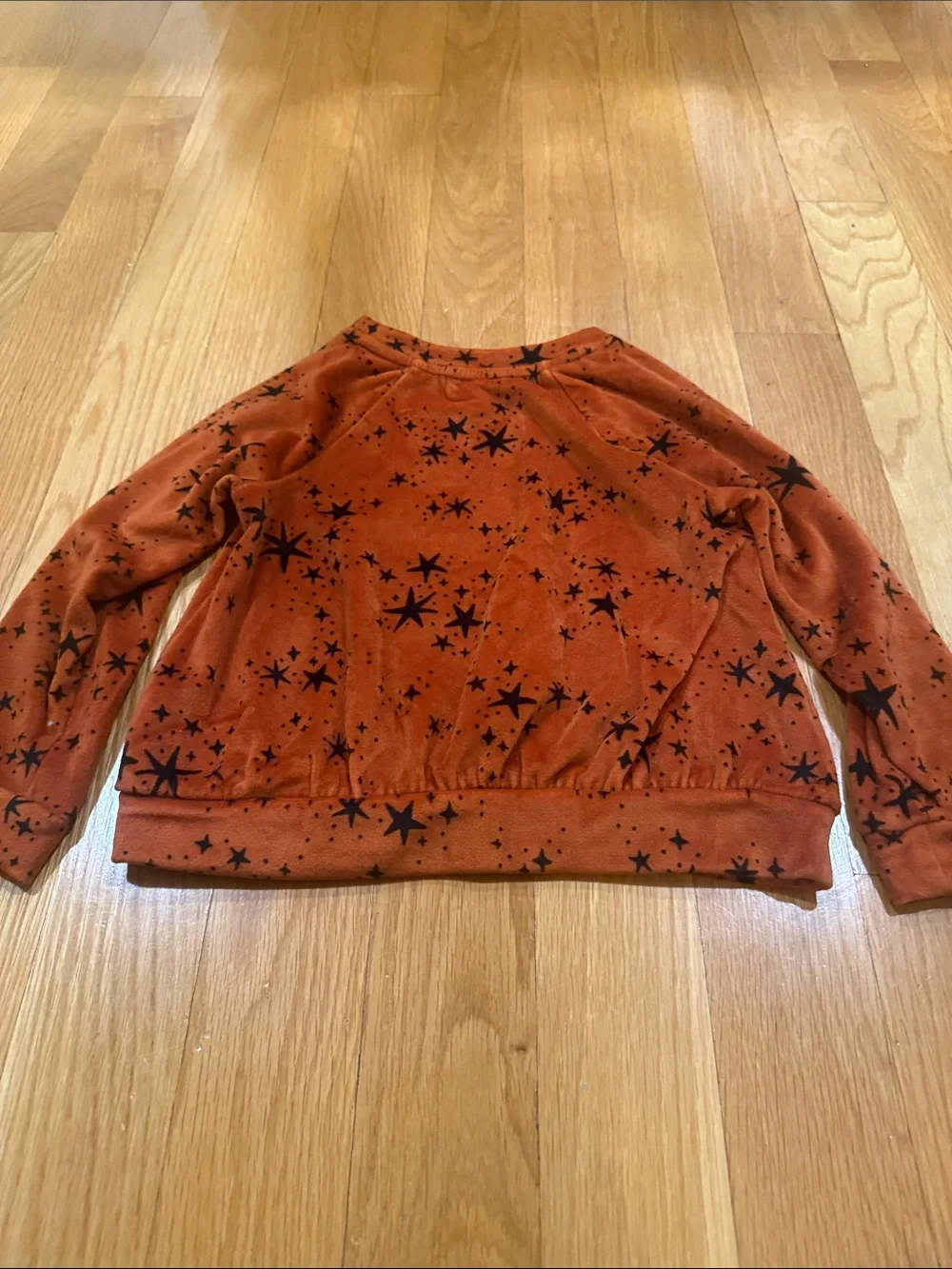 Cat & Jack rust orange velour set with black star pattern size xsmall.
